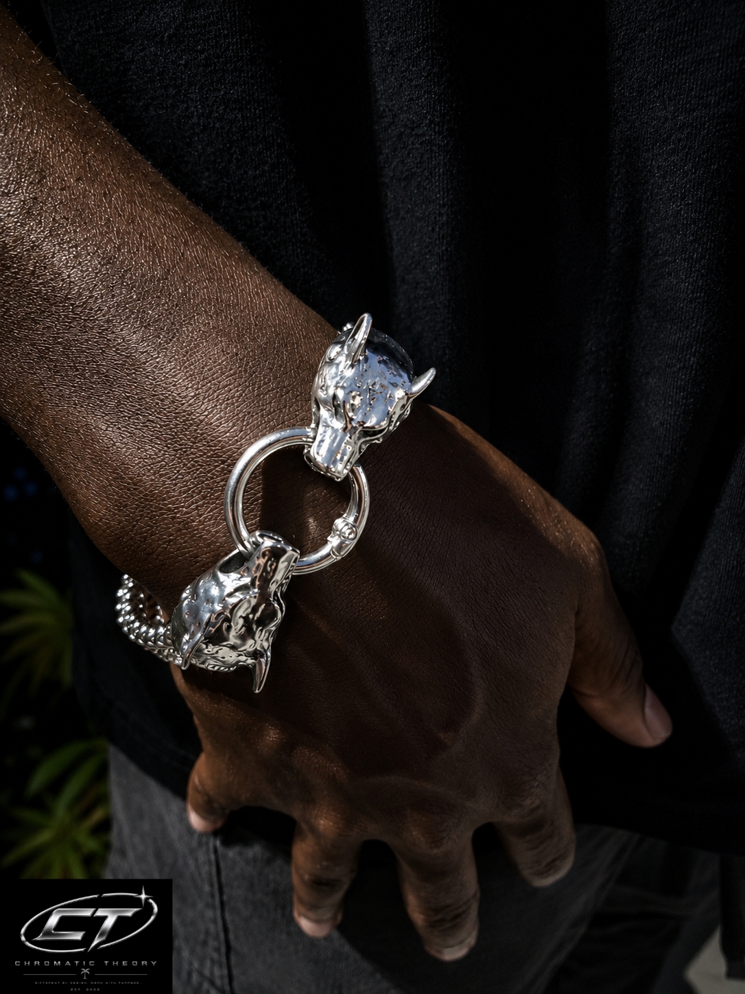 Silver Fenrir bracelet worn by a model
