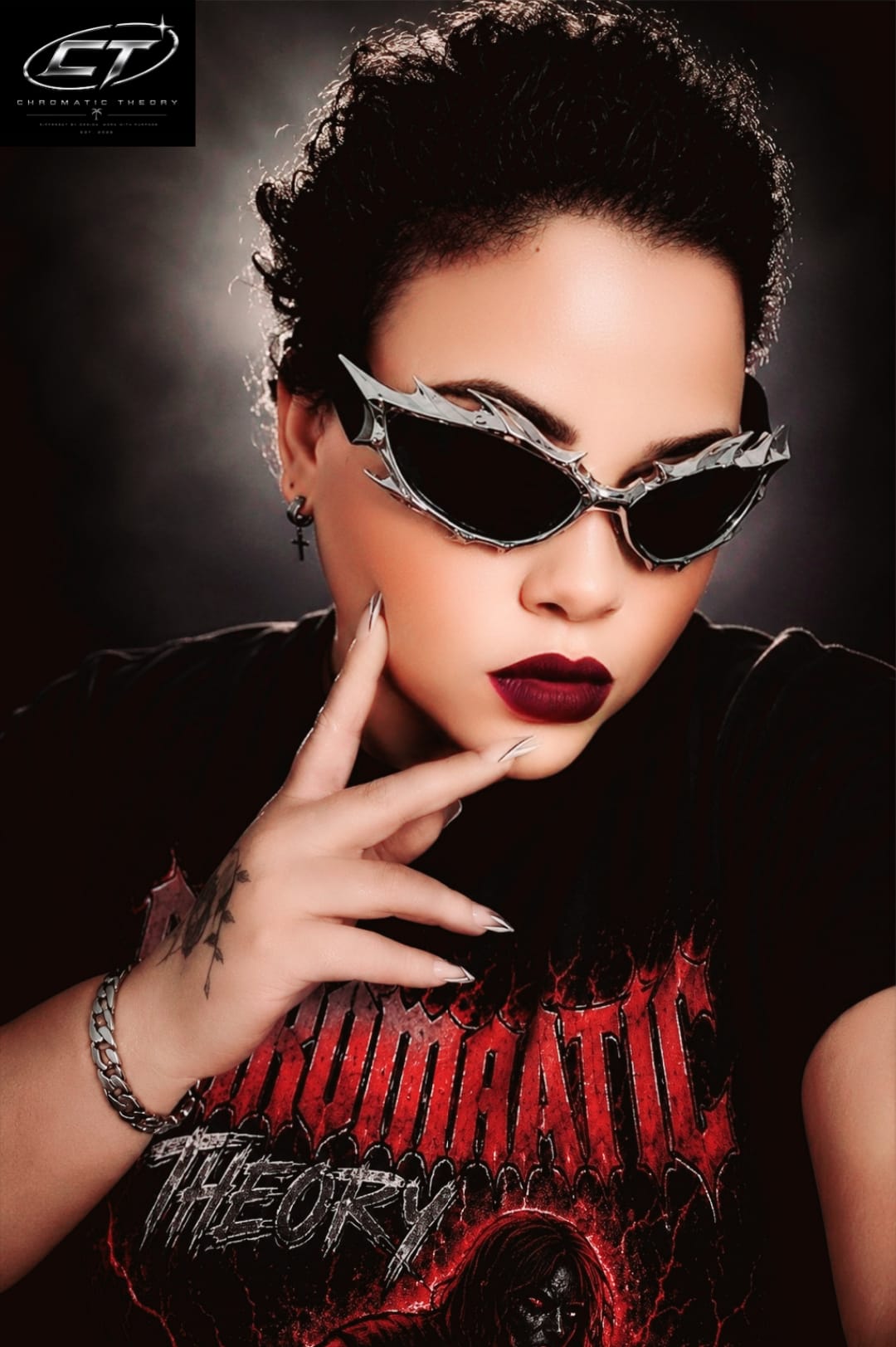 Silver-frame Inferno Drip sunglasses styled on a model
