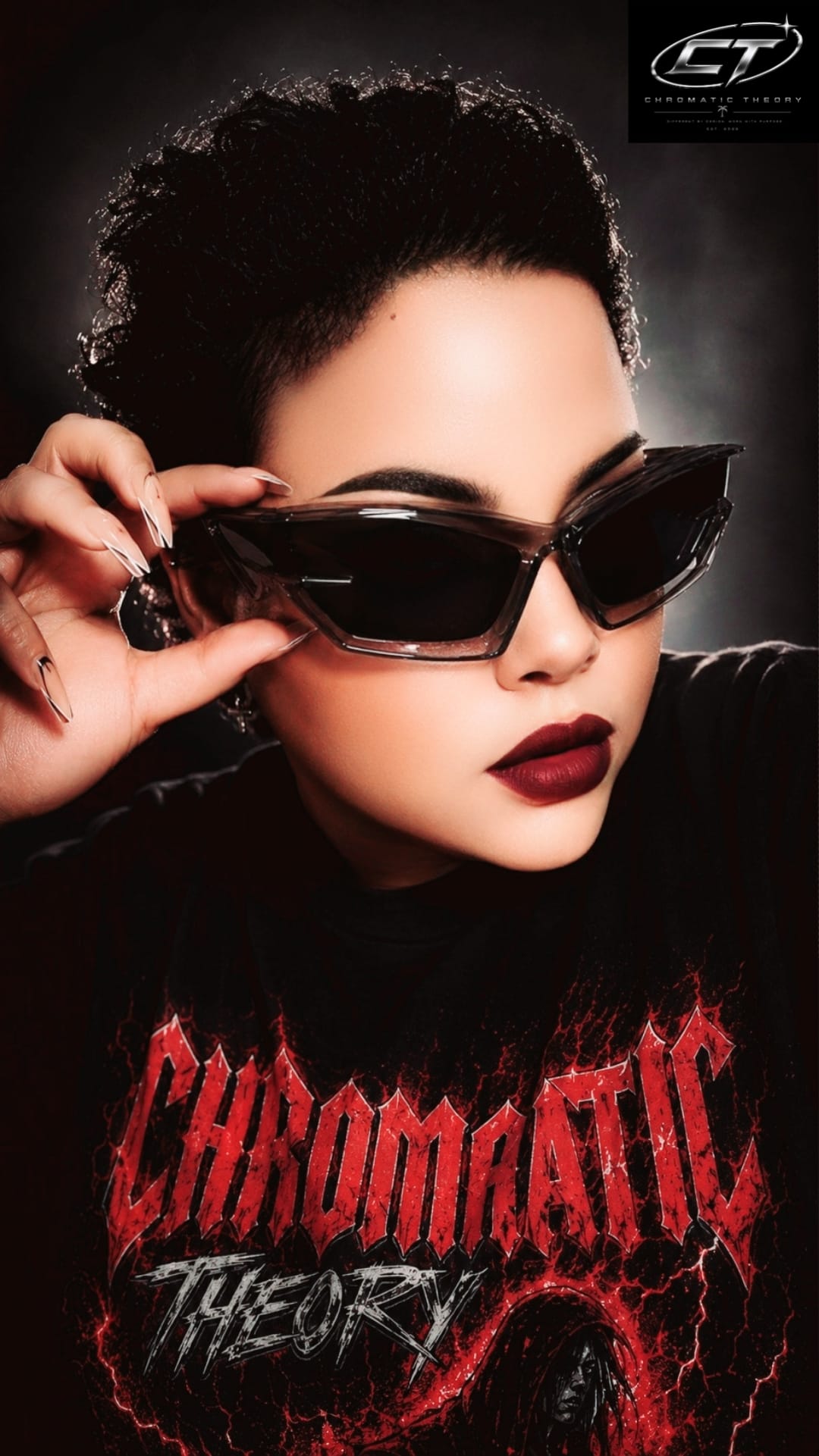 Smoke-frame Phantom sunglasses styled on a model